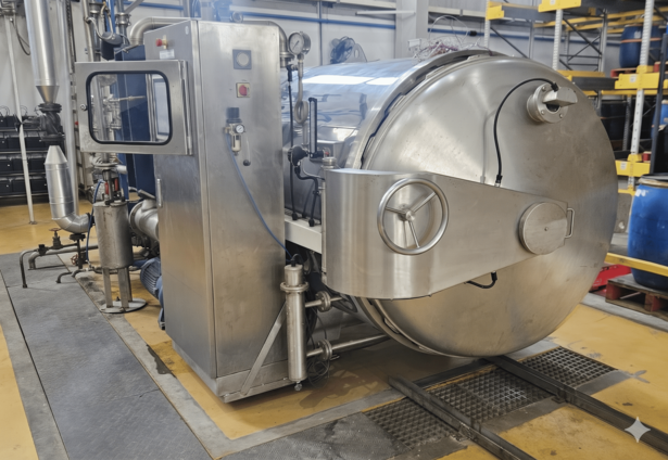 Horizontal retort with its control panel, installed in a food processing plant